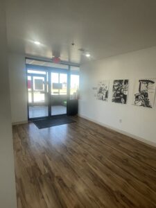 Welcoming front entrance of Spruce Canyon Wellness with bright natural light and wall art